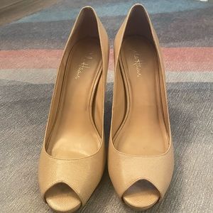 “Cole Haan” and Air Nike beige peep-toe pumps. Size 10 B.